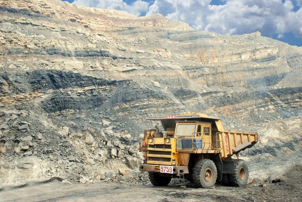 Mining operations with heavy industrial equipment